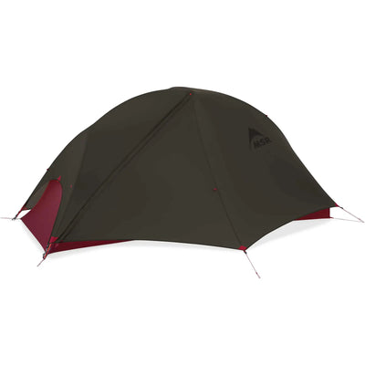 Ein kuppelförmiges MSR® FreeLite™ 1 „V2“ Ultraleichtes 1-Personen-Backpacking-Zelt vor weißem Hintergrund.