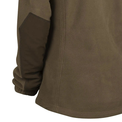 Seitenansicht einer braunen Helikon-Tex® Women's Cumulus Jacket – Heavy Fleece mit Schwerpunkt auf Ärmel- und Taillensaum.