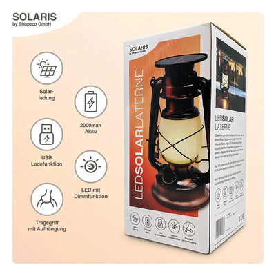 Solaris LED-Solarlaternenverpackung mit Funktionen wie Solaraufladung, 2000-mAh-Akku, USB-Funktionalität, Warmlicht-LED mit Dimmfunktion und Tragegriff mit Aufhängung.