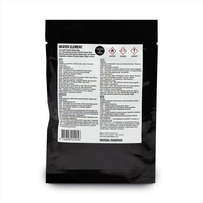 Das Bild zeigt eine schwarze Verpackung mit der Aufschrift „Tactical Foodpack® Heizelement für eine Mahlzeit“ mit Nährwertangaben und Warnsymbolen, die darauf hinweisen, dass es sich um eine Art Fertiggericht oder MRE (meal, ready-to-eat) handelt.
