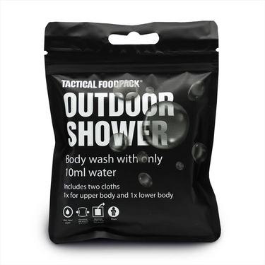 Eine schwarze Verpackung mit der Aufschrift „Tactical Foodpack® Outdoor Dusche“ von Tactical Foodpack®, die für ein Duschgel für Campingzwecke wirbt, das 10 ml Wasser benötigt und zwei Tücher enthält.